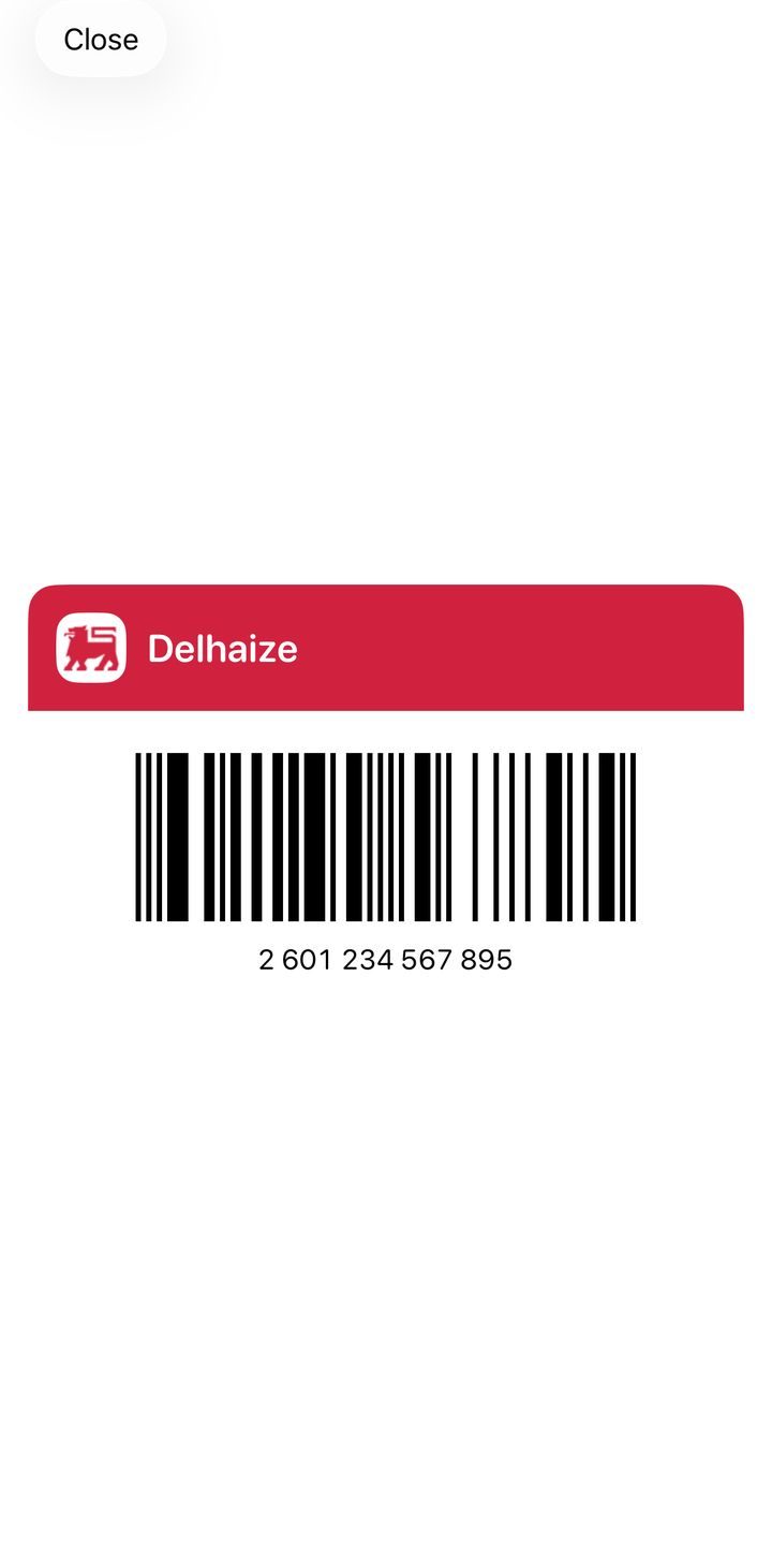 A loyalty card shown full screen with a large barcode